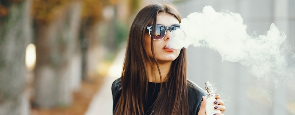 Girl vaping CBD