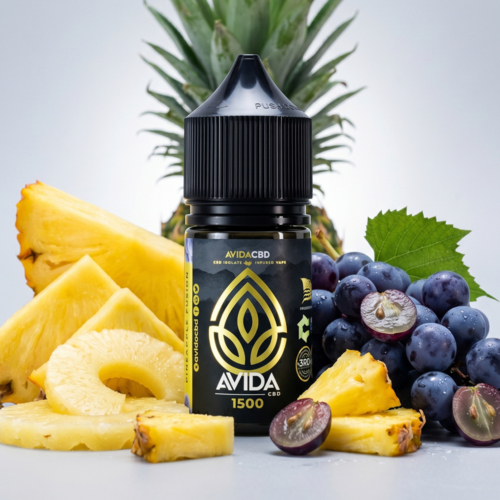 Avida CBD Pineapple Fusion CBD Vape Juice 30ml bottle with fresh pineapple wedges and purple grapes