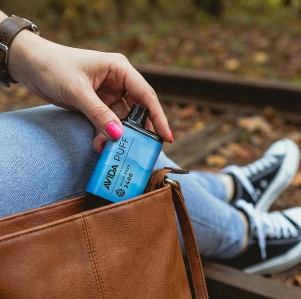 woman holding CBD vape pen